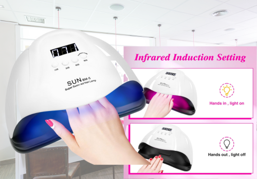 A white SUN M-5 Super Sunuvled Nail Lamp with a blue interior is shown with a hand inserting fingernails with pink polish. An inset on the right, titled "Infrared Induction Setting," shows two scenarios: the top depicts hands inside the lamp with a lit lightbulb icon and the text "Hands In, light on," while the bottom shows hands removed from the lamp with an unlit lightbulb icon and the text "Hands out, light off." This illustrates the lamp's automatic on/off feature.