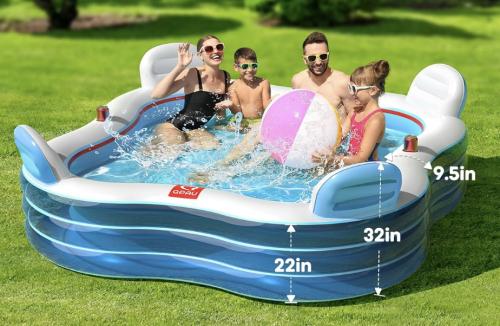A bright blue rectangular inflatable pool sits inflated on a grassy surface.