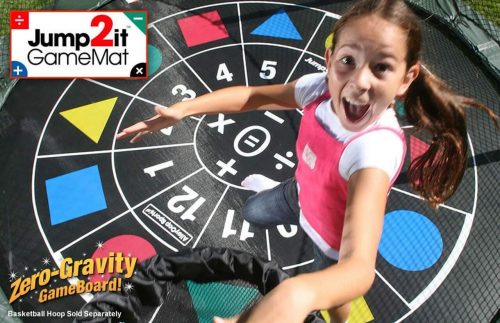 The girl jumping on the trampoline game mat